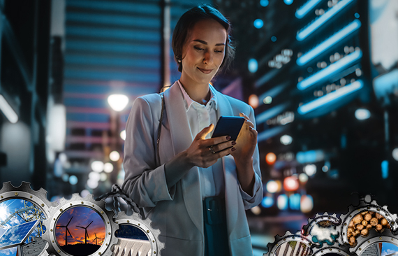 Imagem mostra uma mulher branca, de terno, em uma cena noturna de cidade. Ela usa o seu smartphone enquanto anda pelas ruas.